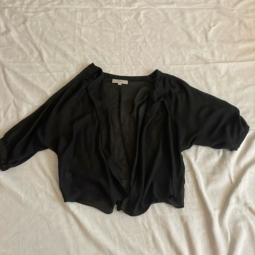 Woman’s button up see through top
